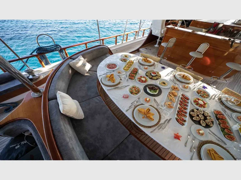 Arif Kaptan A gulet outdoor aft deck dining table