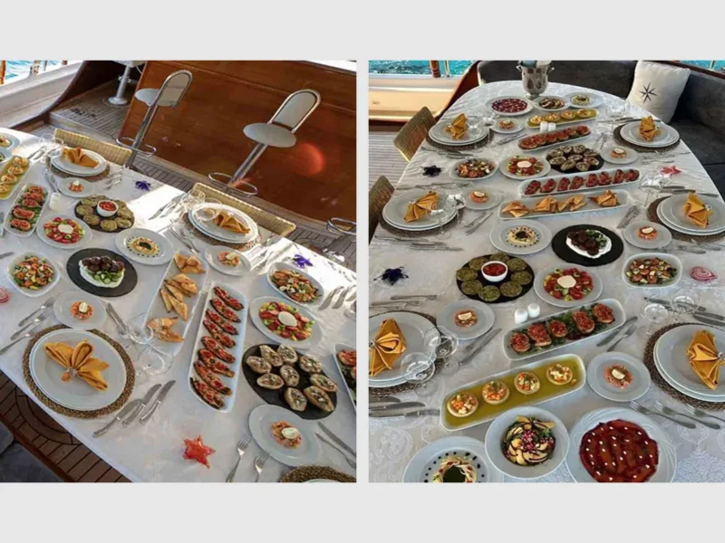 Arif Kaptan A gulet outdoor aft deck dining table food presentation