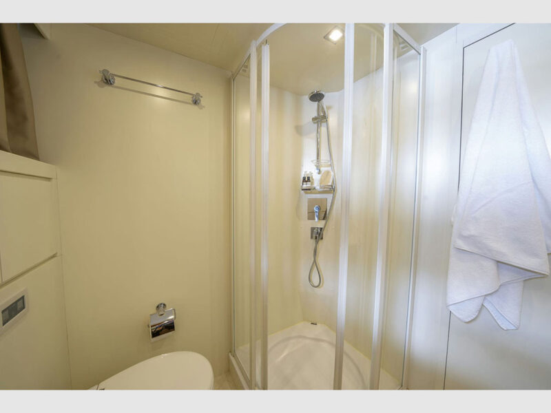 Sanref Falcon 115 charter yacht interior lower deck VIP cabin bathroom