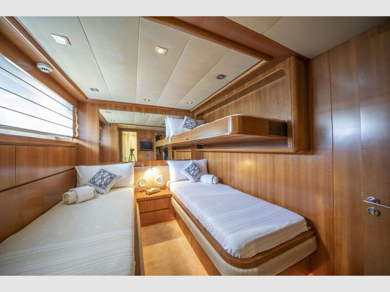 Sanref Falcon 115 charter yacht interior lower deck twin cabin with pullman bed open