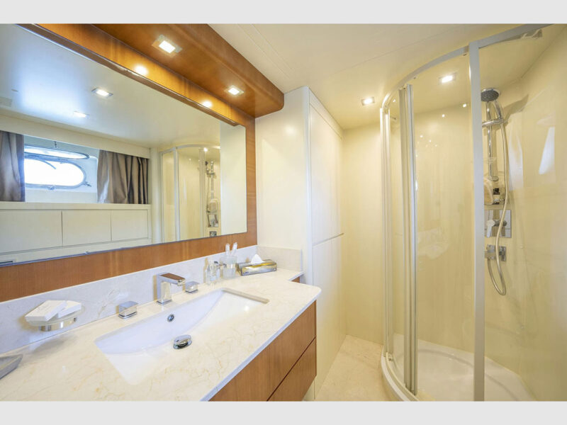 Sanref Falcon 115 charter yacht interior lower deck twin cabin bathroom