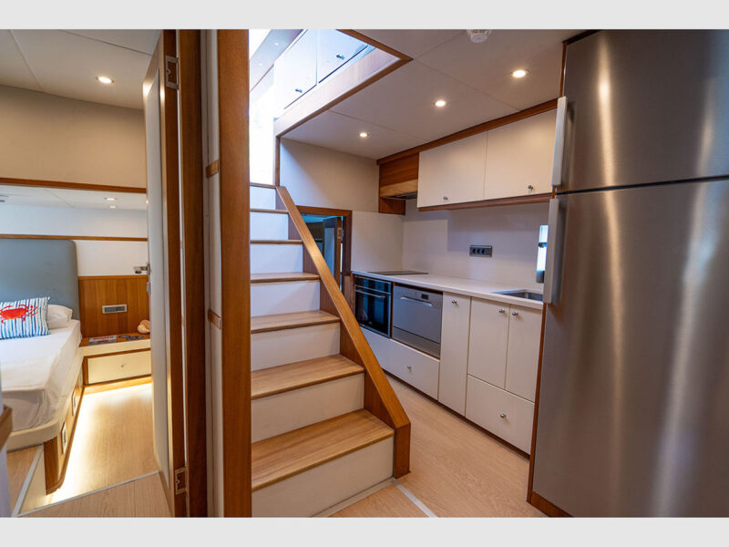 Gottiri yacht interior hallway stairs and galley
