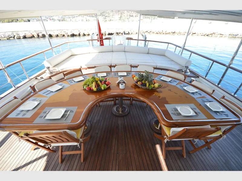 Gul Sultan charter gulet outdoor aft deck dining table setting