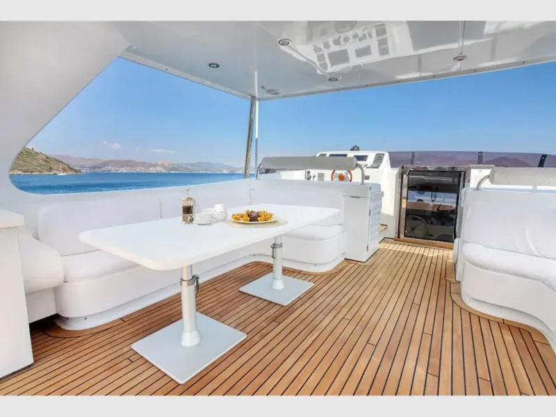 Julem-1 charter motor yacht outdoor upper deck dining table