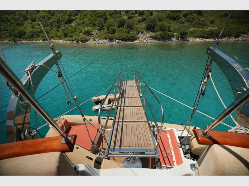Kocaoglan-1 gulet outdoor, shore view from passerelle with two tender boats