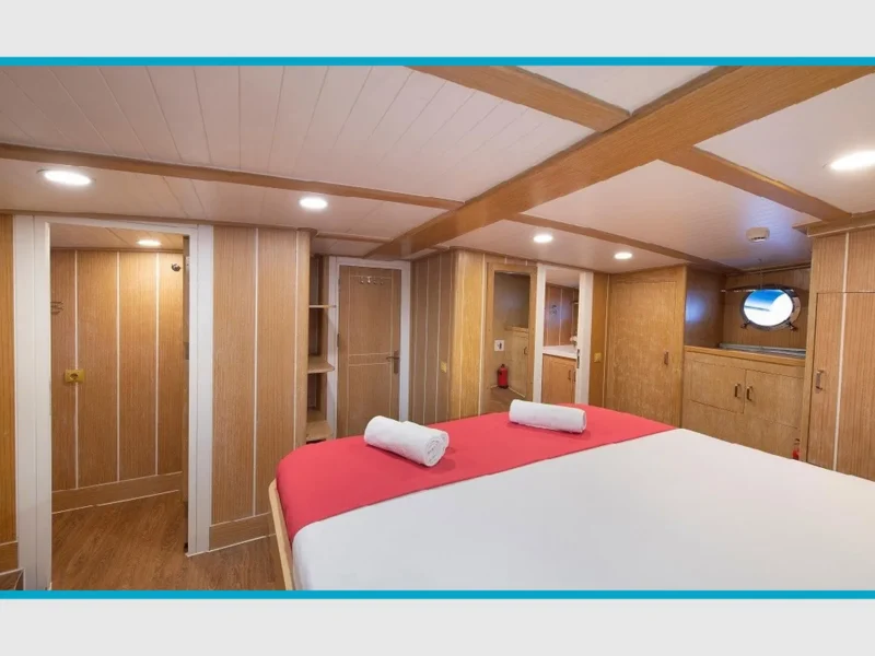 Oguz Bey gulet interior aft master cabin wide angle