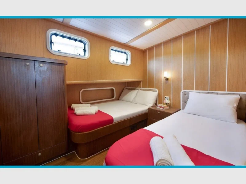Oguz Bey gulet interior triple cabin 1 wide angle