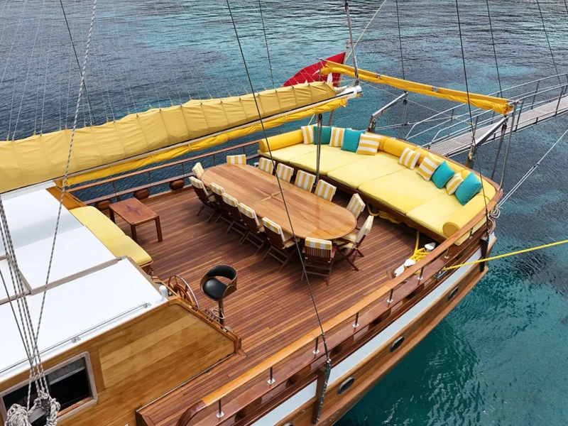 Parss gulet outdoor aft deck close-up drone shot