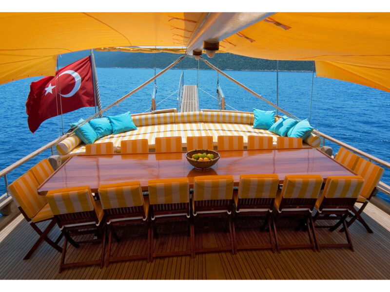 Parss Gulet aft deck dining table and sunbeds