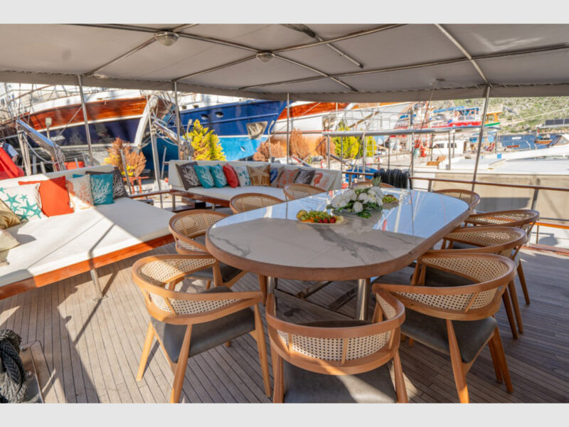 Princess Alize Gulet Outdoor Aft Deck Dining Table and Lounge Beds
