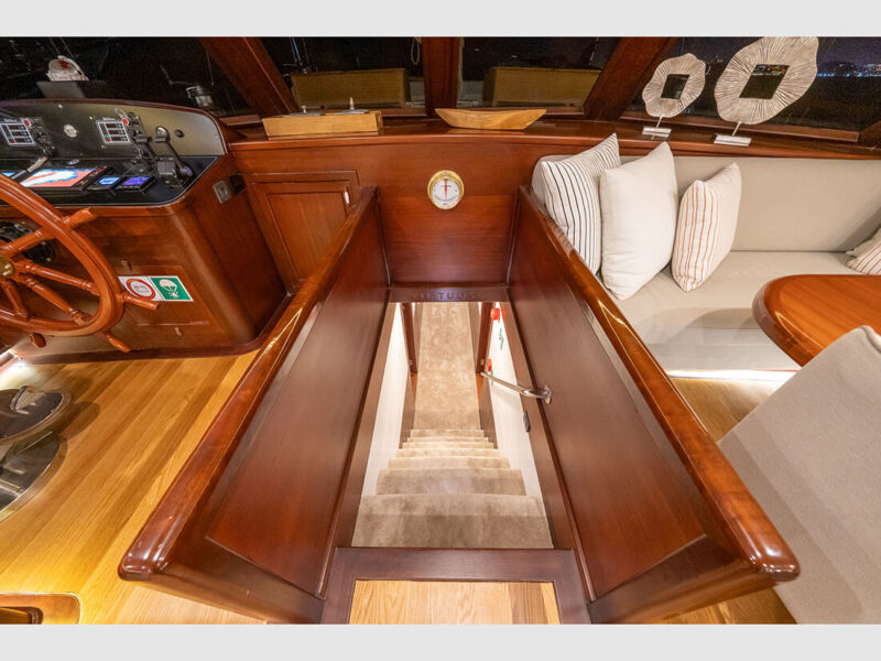 Virtuoso gulet interior stairs to lower deck hallway from saloon