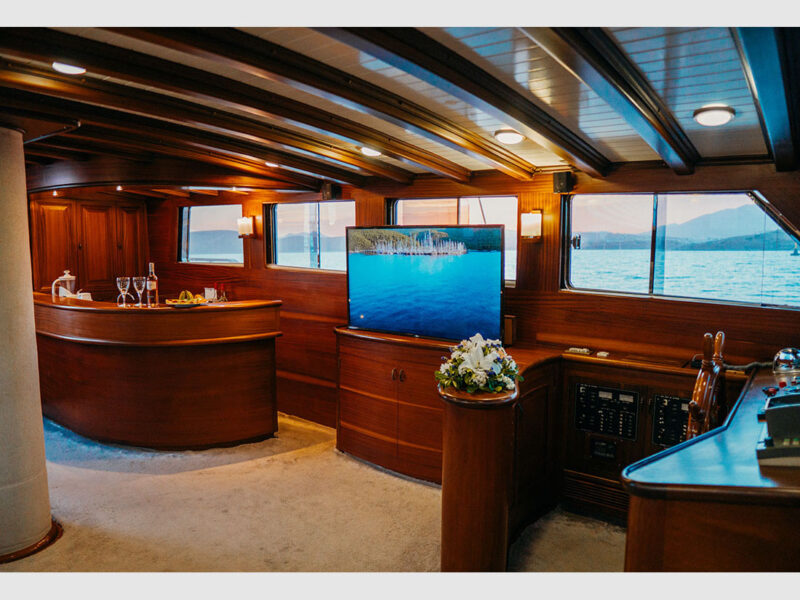 Wicked Felina gulet interior saloon bar, TV and wheel house