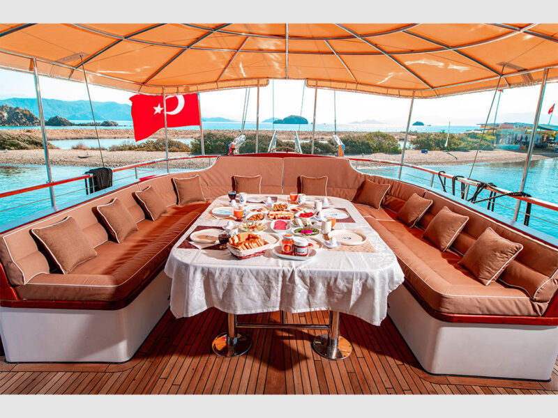 Afilli Gulet outdoor aft deck dining table in the morning