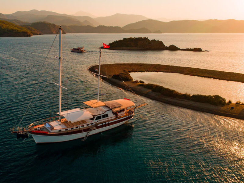Afilli Gulet exterior drone shot at sunset in Yassica Islands