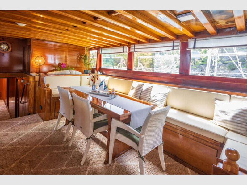 Gideon gulet Croatia charter yacht indoor saloon dining table