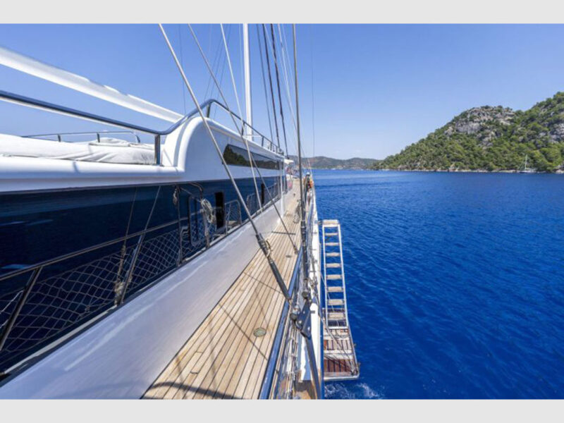 Holiday 10 charter gulet outdoor side deck and stairs to sea