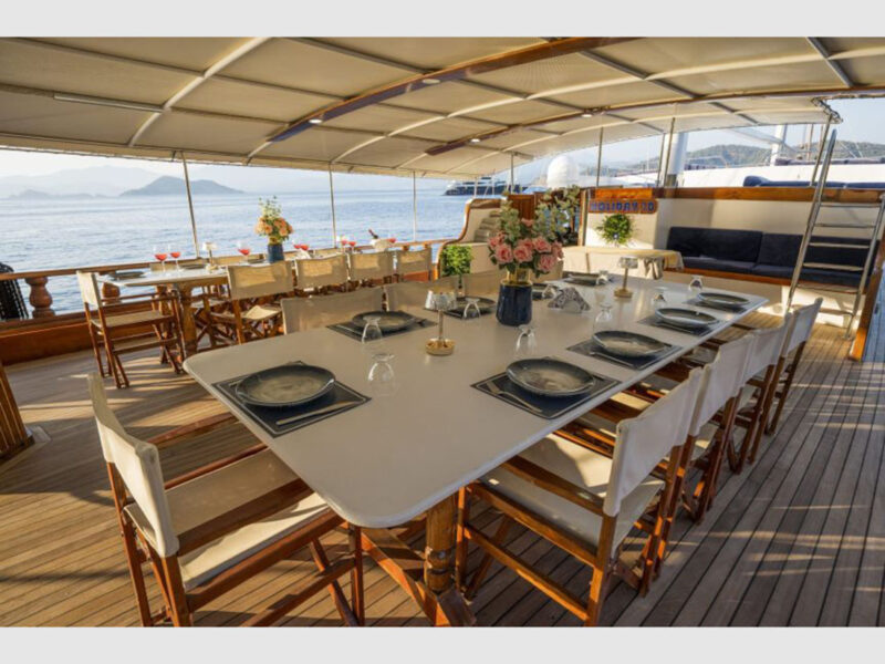 Holiday 10 charter gulet outdoor aft deck dining tables