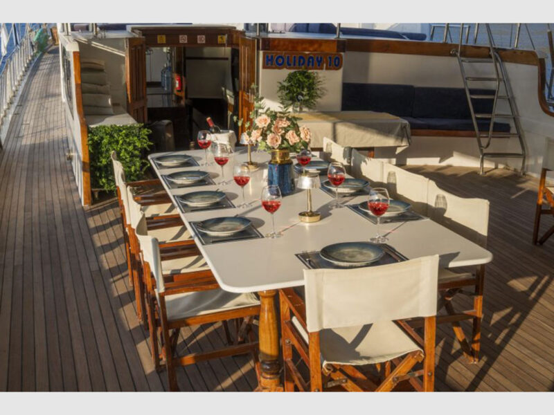 Holiday 10 charter gulet outdoor aft deck dining table close-up
