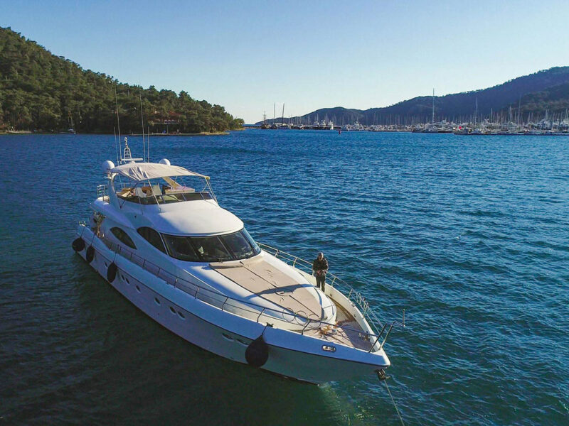 Viva Lola charter yacht exterior drone shot from bow starboard quarter