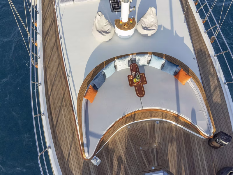 Diva Deniz gulet outdoor fore deck lounge area drone shot from top