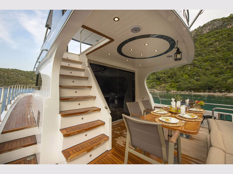 Golden Blue motor yacht outdoor aft deck wide angle
