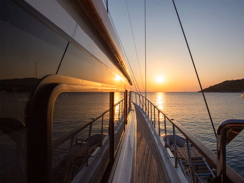 Grand Sailor gulet outdoor side deck at sunset