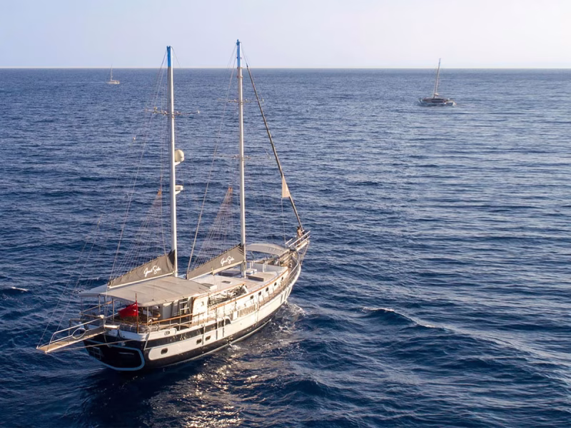 Grand Sailor gulet exterior drone shot from starboard aft quarter