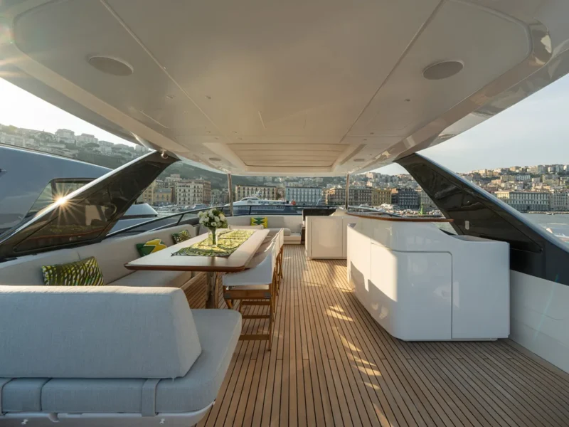 Angelo Azimut Grande 26 charter motor yacht outdoor upper deck dining table and bar