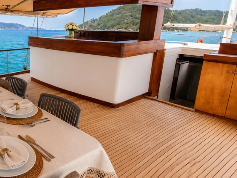 Flores gulet charter yacht outdoor aft deck bar and entrance to saloon