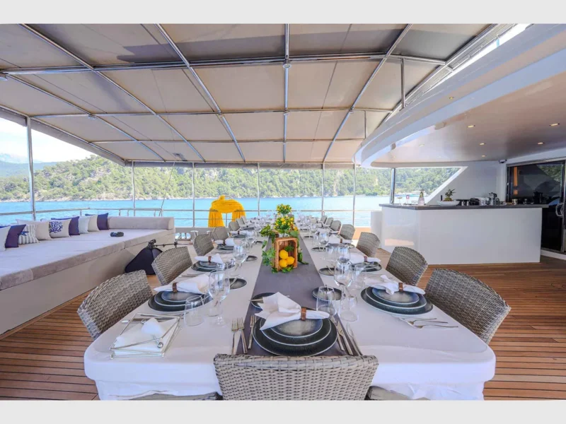King of The Sea gulet luxury charter yacht outdoor aft deck dining table