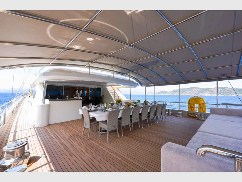 King of The Sea gulet luxury charter yacht outdoor aft deck wide angle shot from port side
