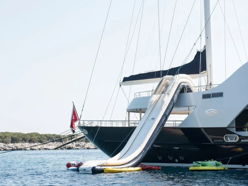 Meira motorsailer charter yacht, entertainment feature sea slide from upper deck