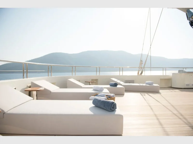 Meira motorsailer charter yacht outdoor upper deck sunbeds