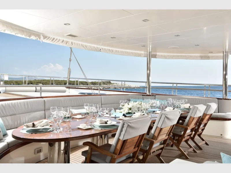Meira motorsailer charter yacht outdoor main deck dining table wide angle