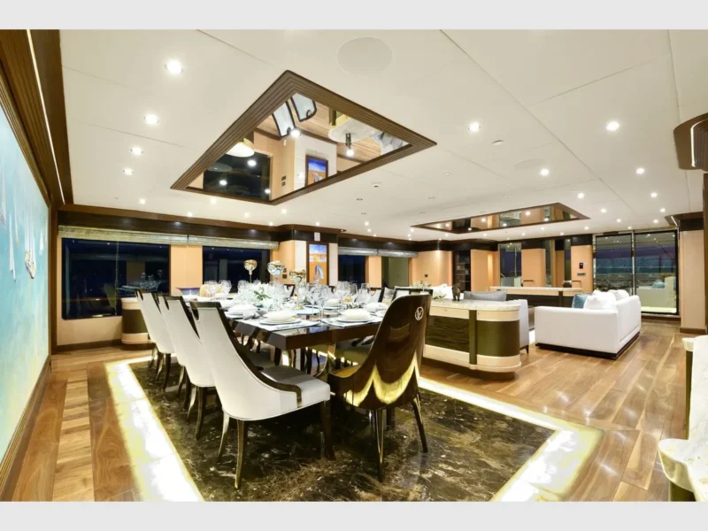 Meira motorsailer charter yacht interior salon wide angle view from dining table