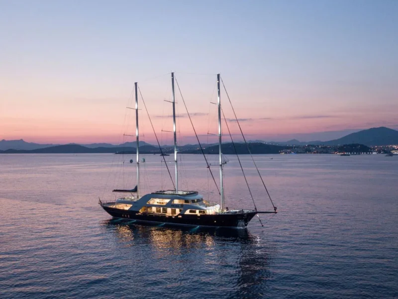 Meira motorsailer charter yacht aerial drone shot in the evening from starboard bow quarter