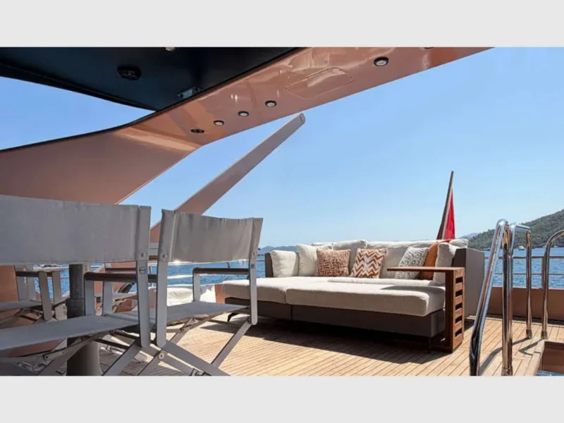 Admiral 115 Poseidon charter motor yacht outdoor upper deck sunbed sofa located at the aft