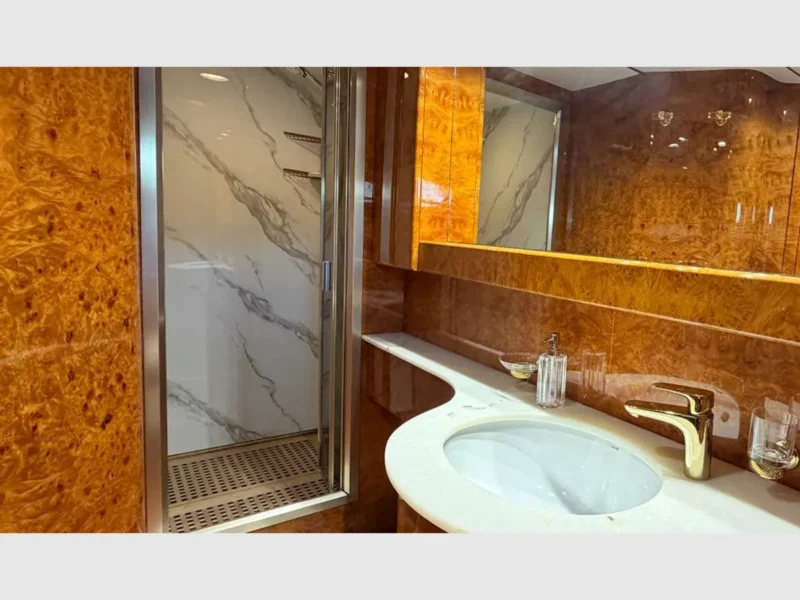 Admiral 115 Poseidon charter motor yacht interior VIP cabin bathroom