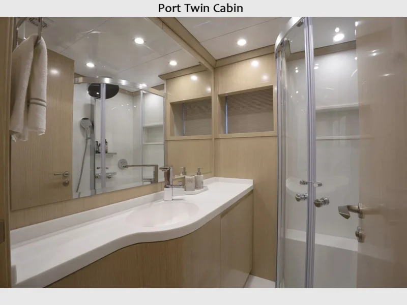 Princess Melda motor yacht charter, interior port twin cabin bathroom