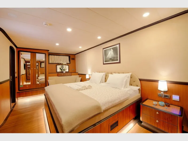 Queen of Salmakis gulet interior fore master cabin wide angle