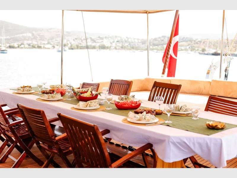 Sunworld 8 gulet charter yacht Bodrum, outdoor aft deck dining table