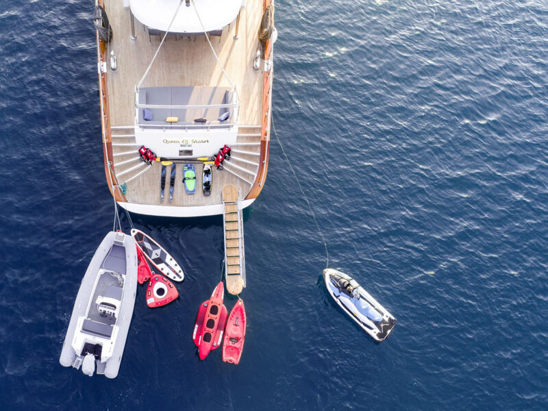 Queen of Makri exterior drone shot offore deck seating area