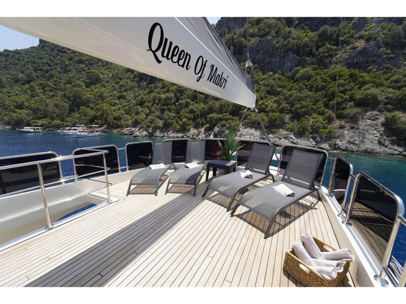 Queen of Makri outdoor upper deck sunbeds wide angle