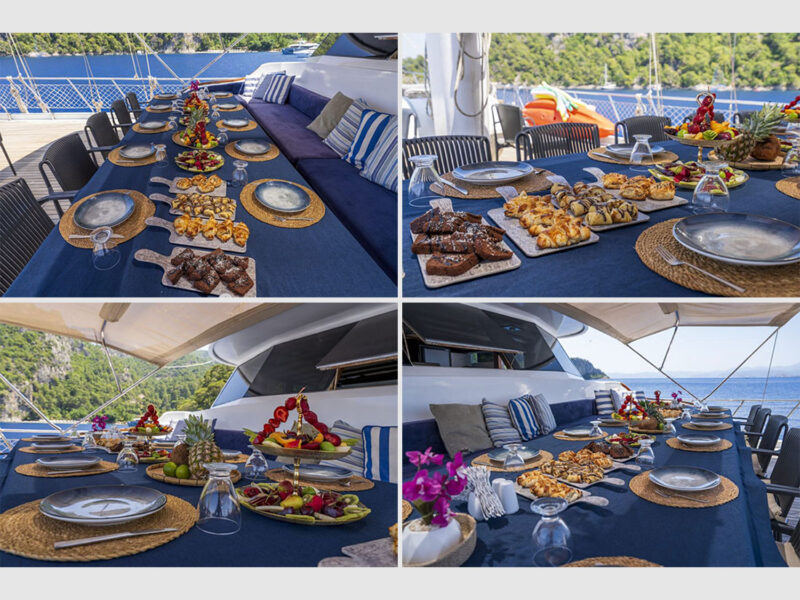 gulet Holiday 10 kiralık yat dış mekan ön güverte yemek masası düzeni detaylar